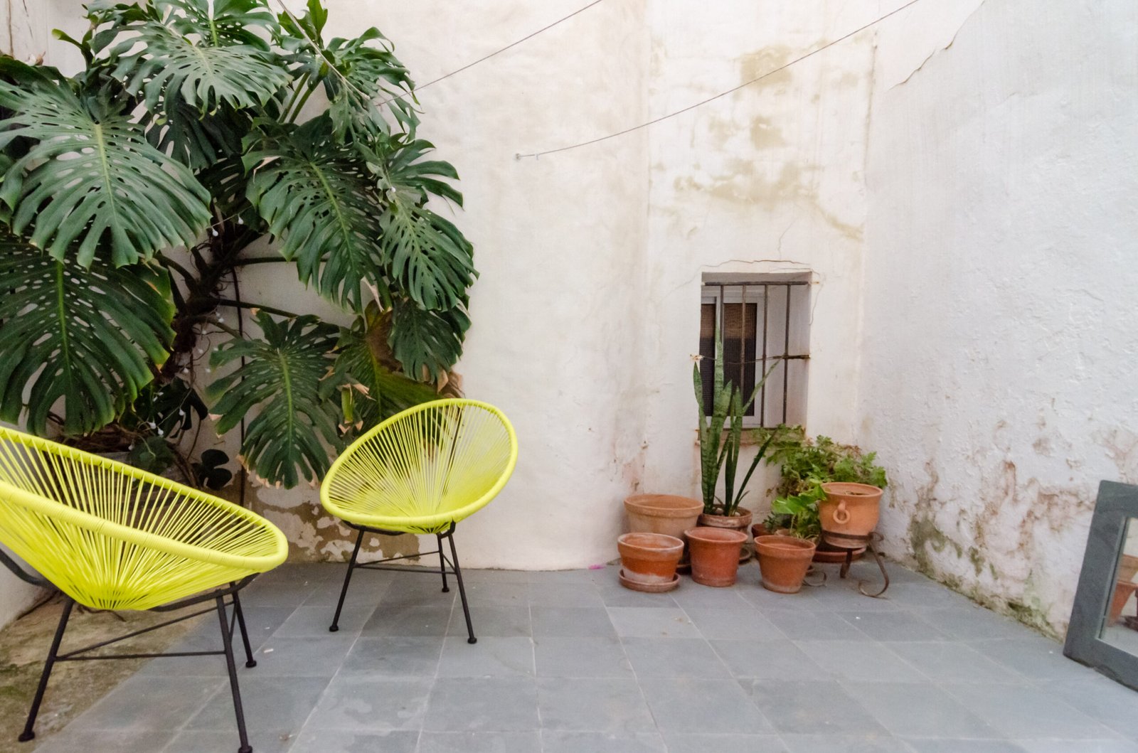 A cozy studio with a rare private patio, just minutes from the beach.
