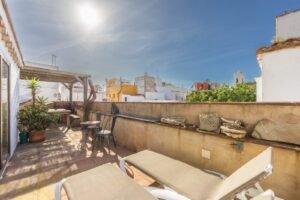 Sun loungers on the terrace at Riad Casa Luna in Tarifa