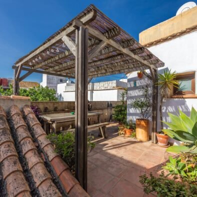 Terrace dining area at Riad Casa Luna in Tarifa