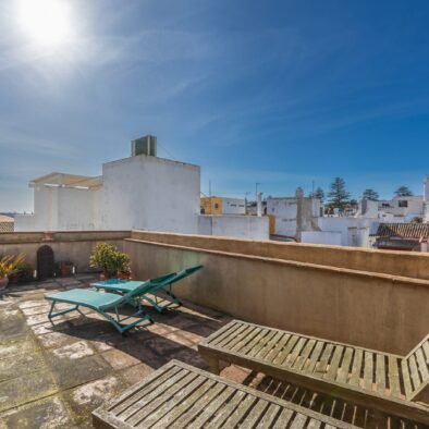 Terrace with sun loungers and old town views at Riad Casa Luna