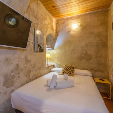 Bed area at Secret Patio studio in Tarifa