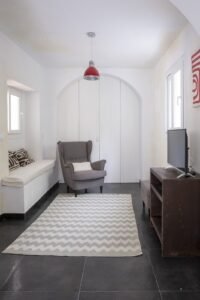 Sofa and reading corner at Rooftop Penthouse in Tarifa