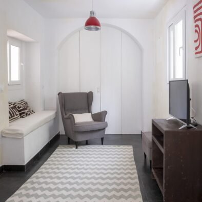 Sofa and reading corner at Rooftop Penthouse in Tarifa