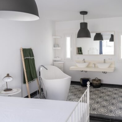 Main bedroom with freestanding bathtub at Rooftop Penthouse