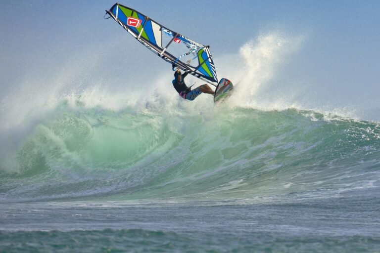 Windsurfer riding a wave in Tarifa